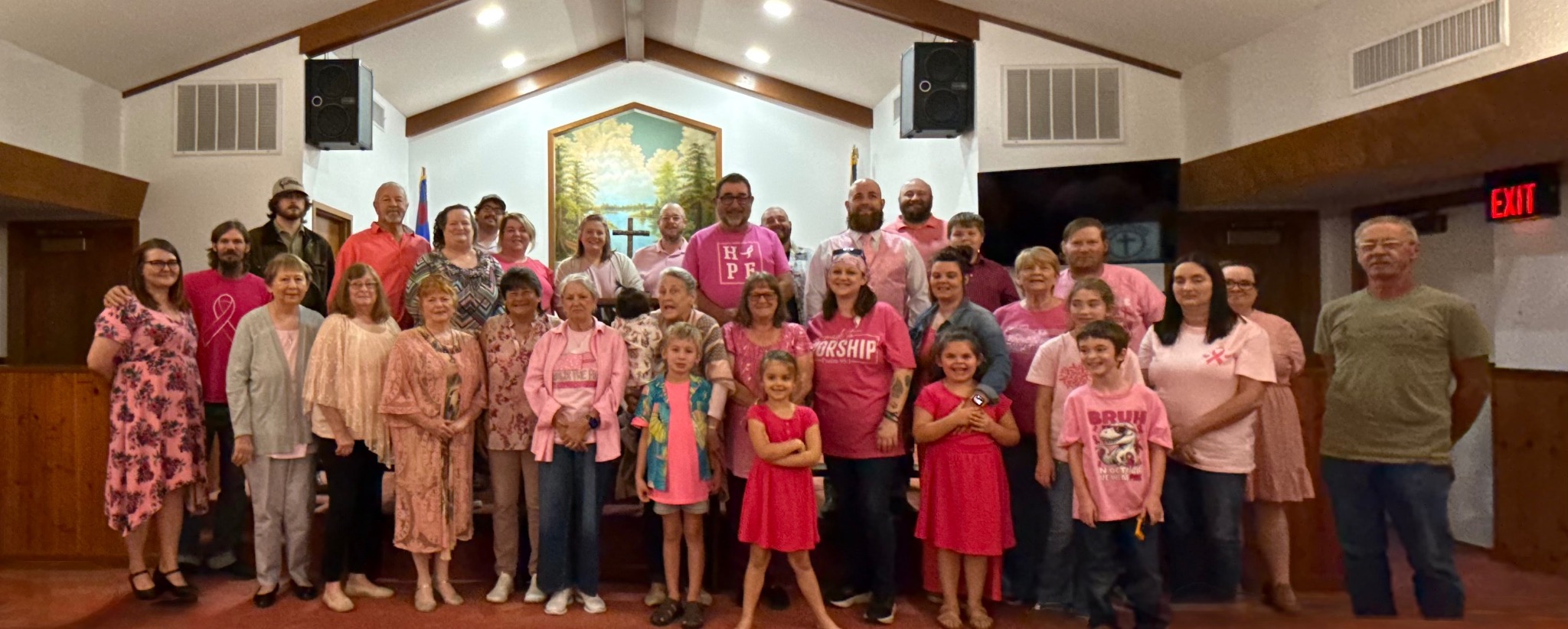 The Zebedee Baptist Church family gathered in the sanctuary wearing pink in support of Breast Cancer Awareness Month